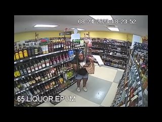 surveillance video shows ta’kiya shoplifting bottles of alcohol before being fatally shot by police
